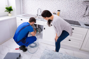 Plumber fixing sink in bathroom in Orlando, FL