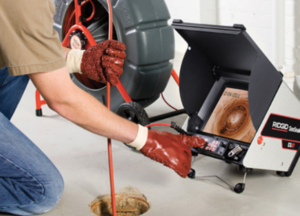 ewer inspection camera being inserted into a drain