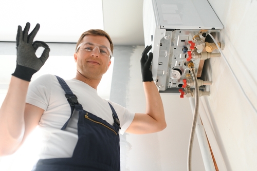 orlando plumber cleaning water heater